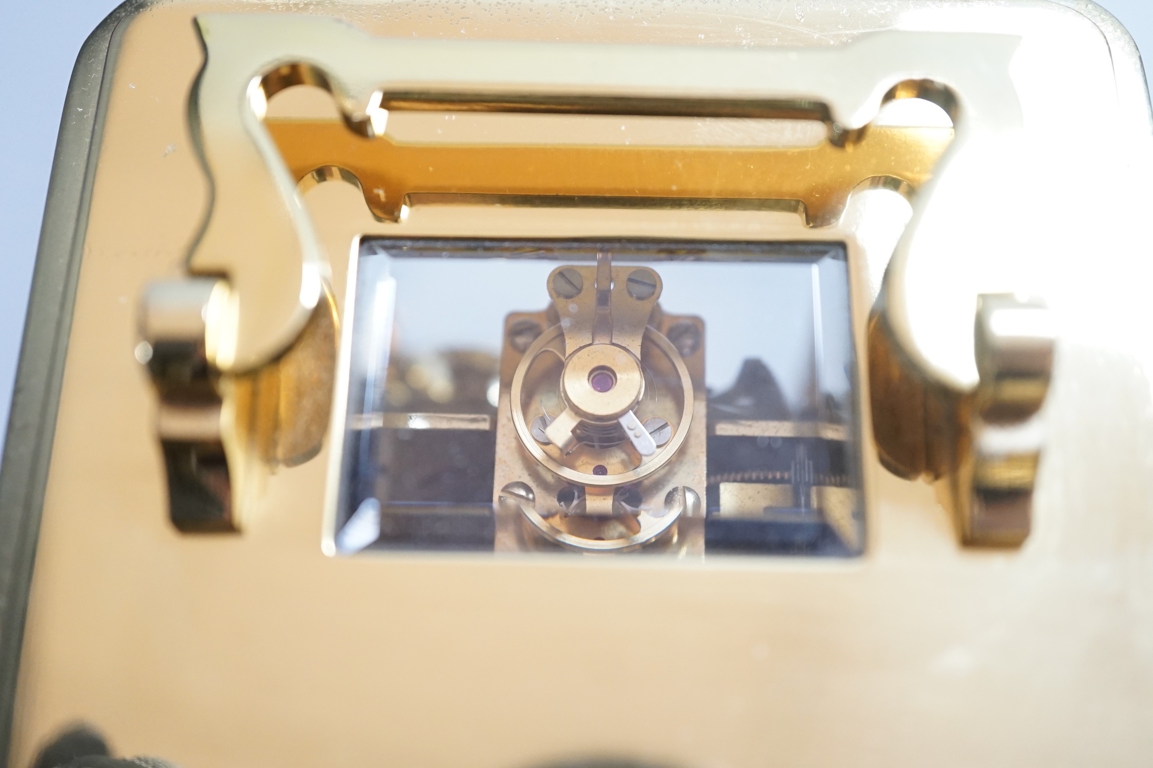 Two brass cased carriage timepieces and a brass cased carriage clock, tallest 11.5cms high